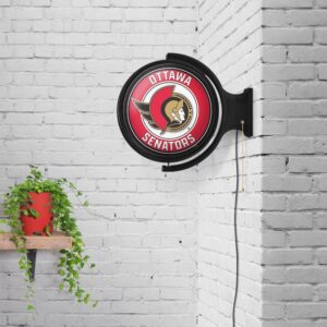 Ottawa Senators: Officially Licensed Round Illuminated Rotating Wall Sign 21" x 5" by Fathead | Metal